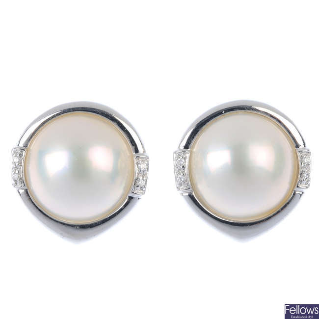 A pair of 14ct gold mabe pearl and diamond earrings.