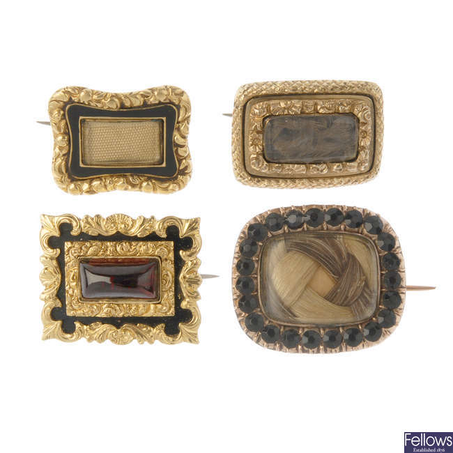 Four mid to late Victorian memorial brooches.