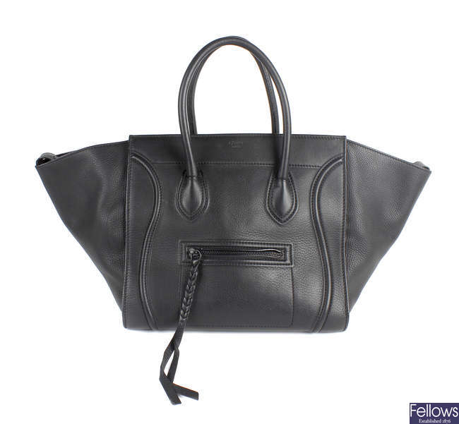 CELINE - a black luggage Phantom handbag.