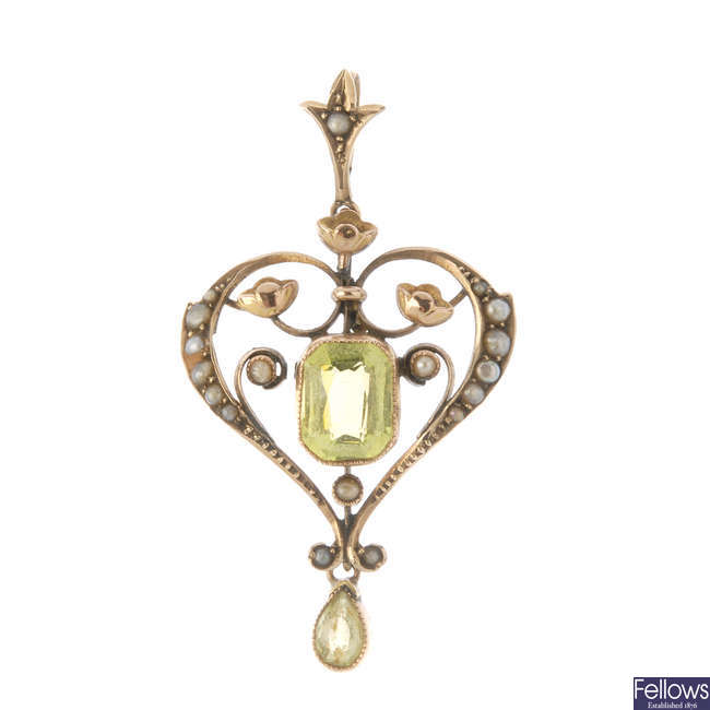 An early 20th century 9ct gold garnet-topped-doublet and paste split pearl pendant.