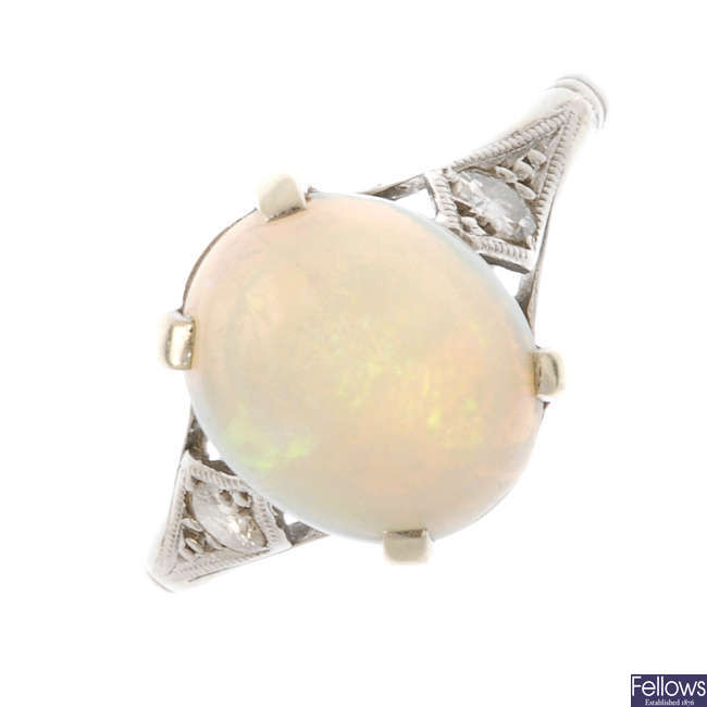 An opal and diamond dress ring.