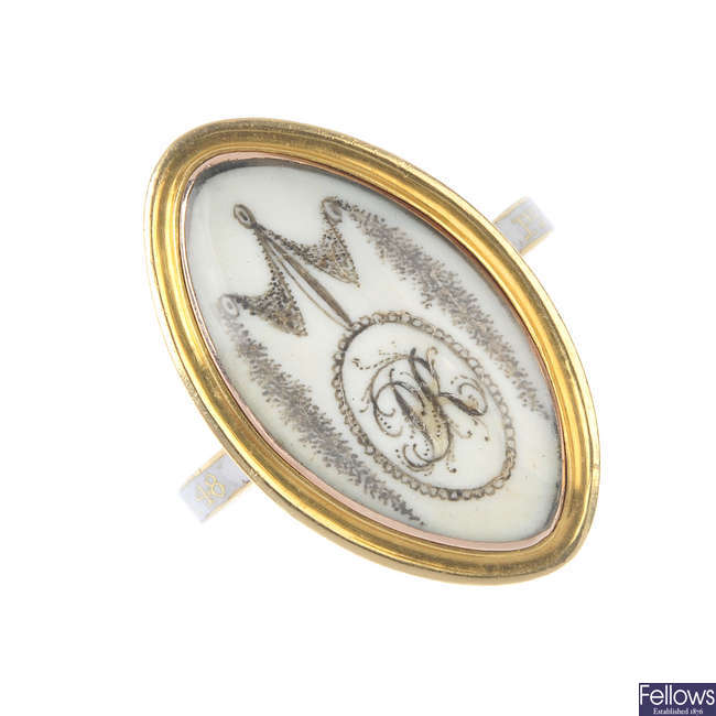 A Georgian gold ivory and enamel mourning ring.