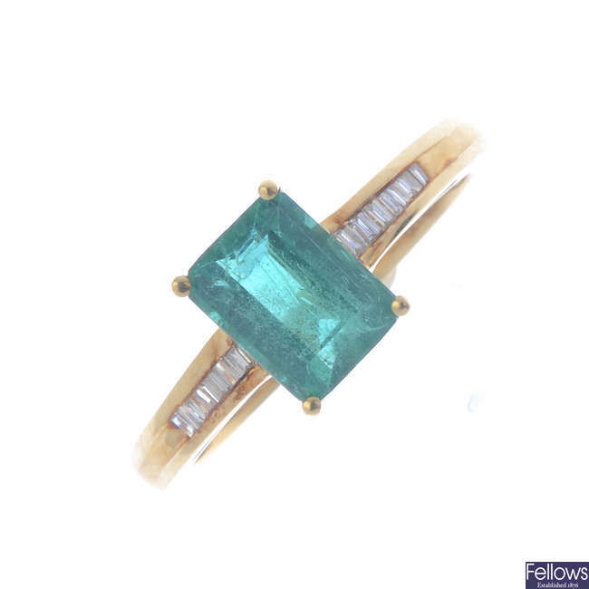 An 18ct gold emerald single-stone ring.