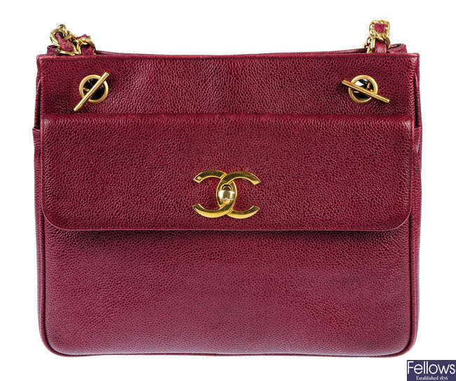 CHANEL - a burgundy caviar leather handbag.