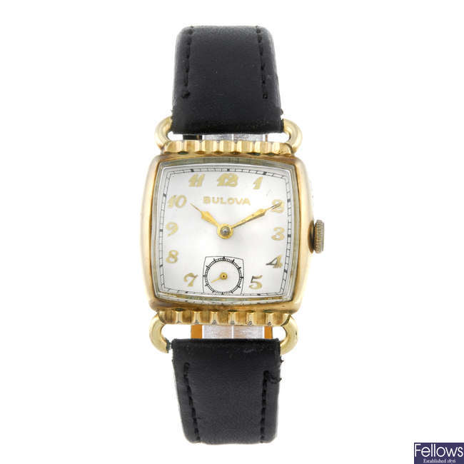 BULOVA - a lady's gold plated wrist watch.