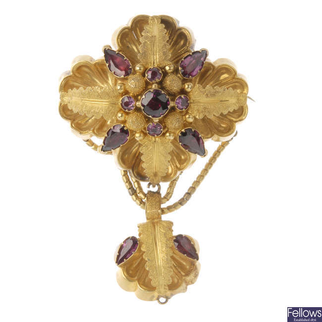A mid 19th century gold foil-back garnet pendant.