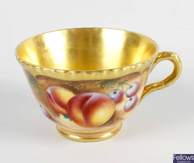 A Royal Worcester porcelain tea cup