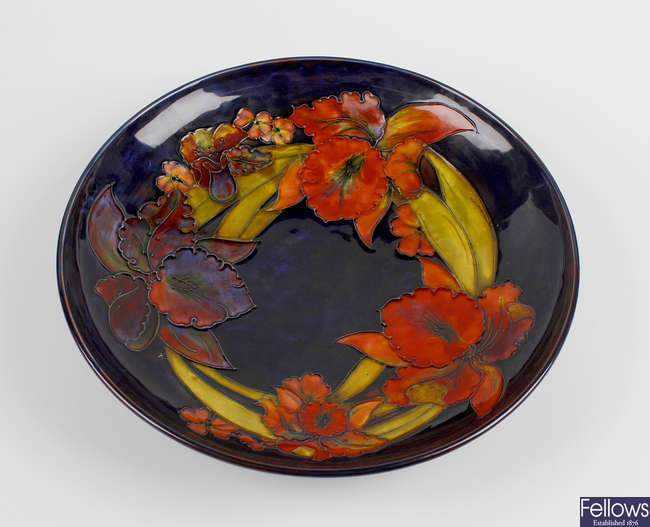 A Walter Moorcroft pottery Orchid pattern dish