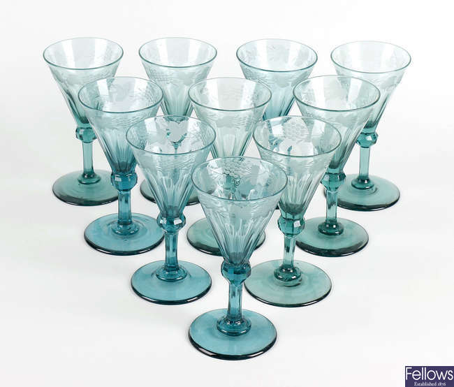 A matching set of twelve Victorian green drinking glasses