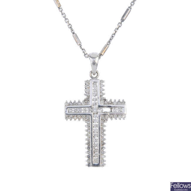 A 9ct gold diamond cross pendant, with chain.