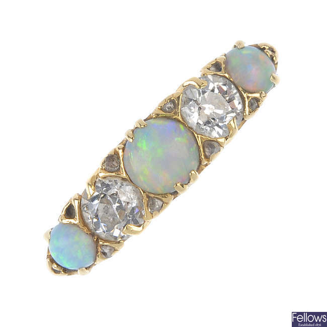 An early 20th century opal and diamond five-stone ring.
