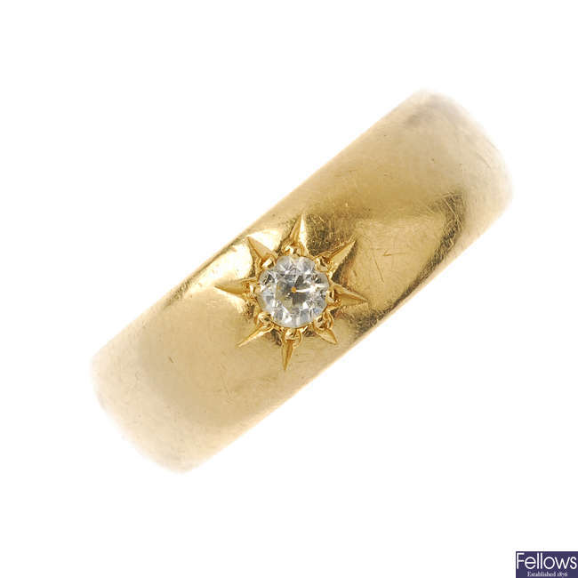 An early 20th century 18ct gold diamond band ring.