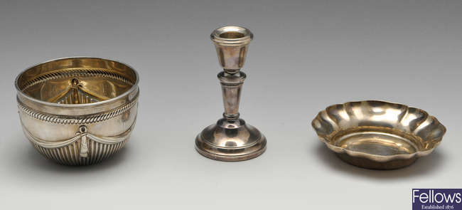 A late Victorian silver bowl, plus a 1960's silver dish and candlestick.