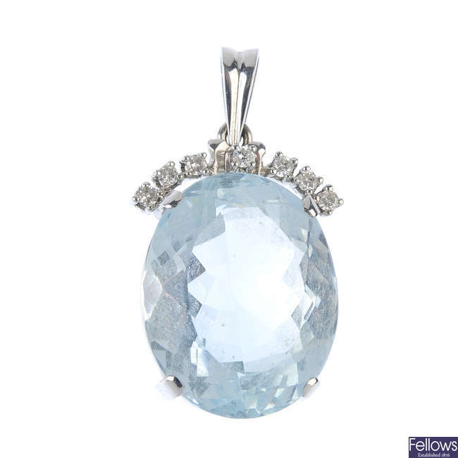 An aquamarine and diamond pendant. 
