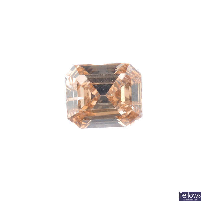 A rectangular-shape coloured diamond, weighing 0.59ct.