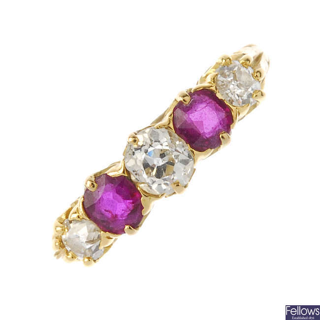 A late Victorian 18ct gold ruby and diamond five-stone ring, circa 1900.
