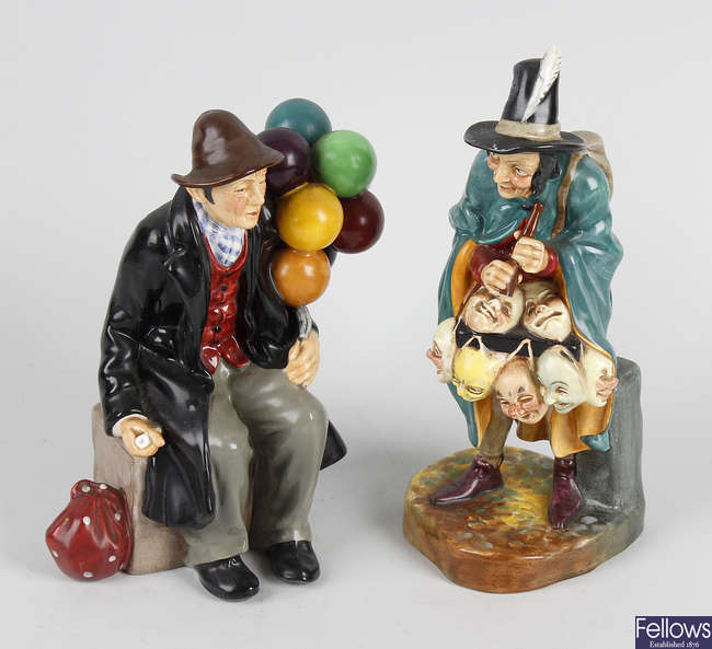 Two Royal Doulton figures, The Mask Seller and The Balloon Man.
