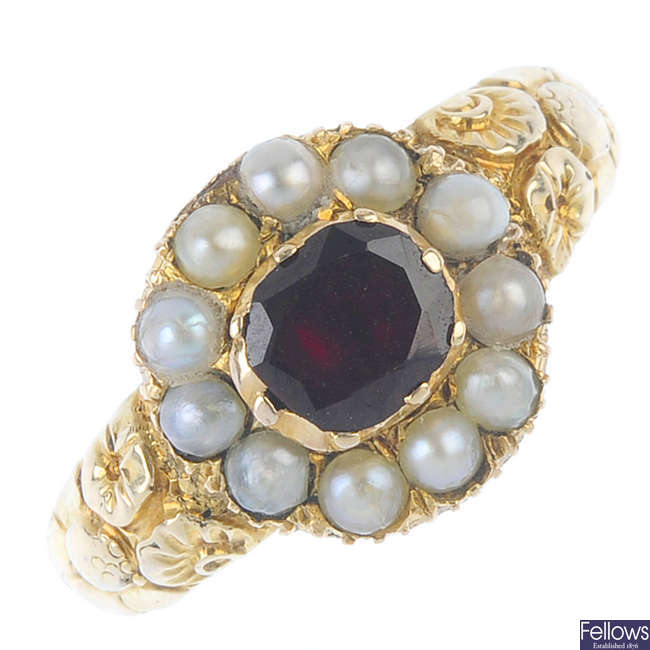 A mid Victorian foil-back garnet and split pearl cluster ring, circa 1860. 