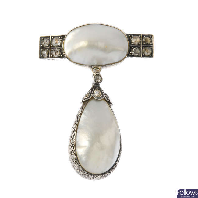 A mabe pearl and diamond brooch.