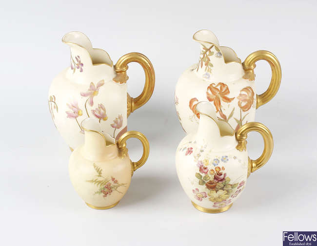 Four Royal Worcester porcelain flatback jugs.