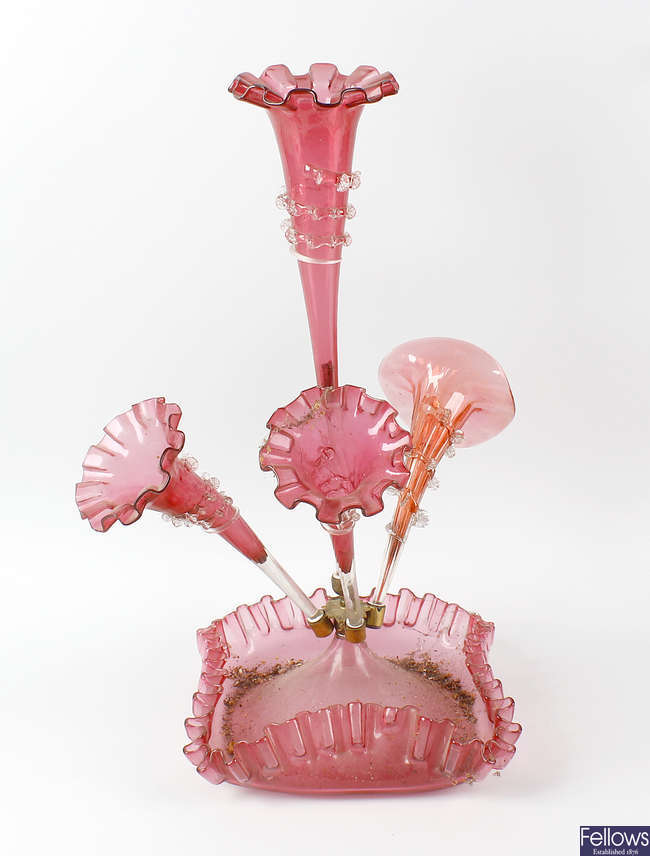 A cranberry glass epergne.