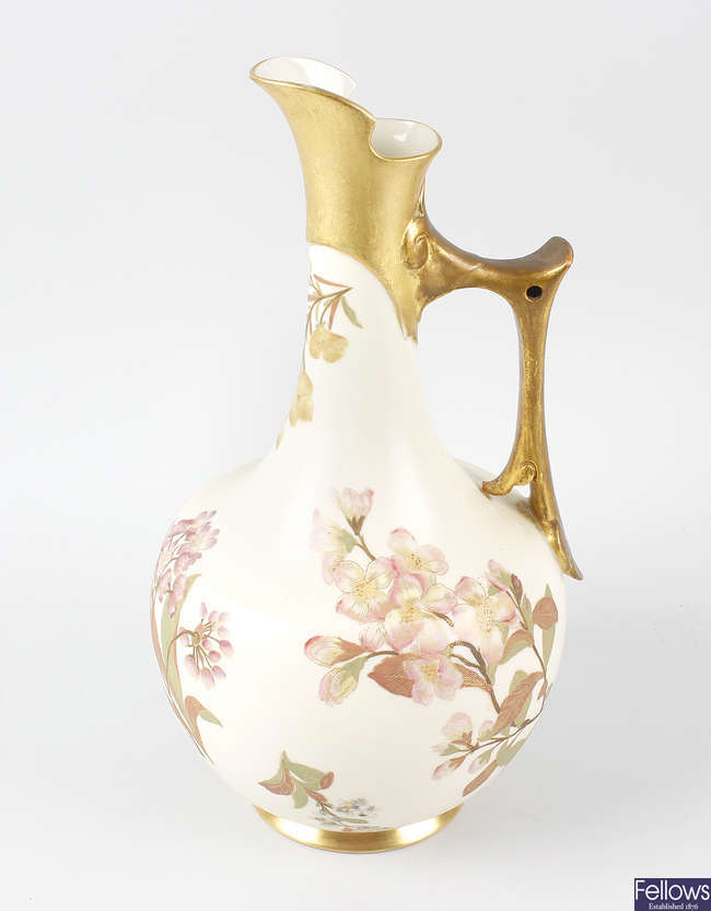 A large Royal Worcester porcelain jug.