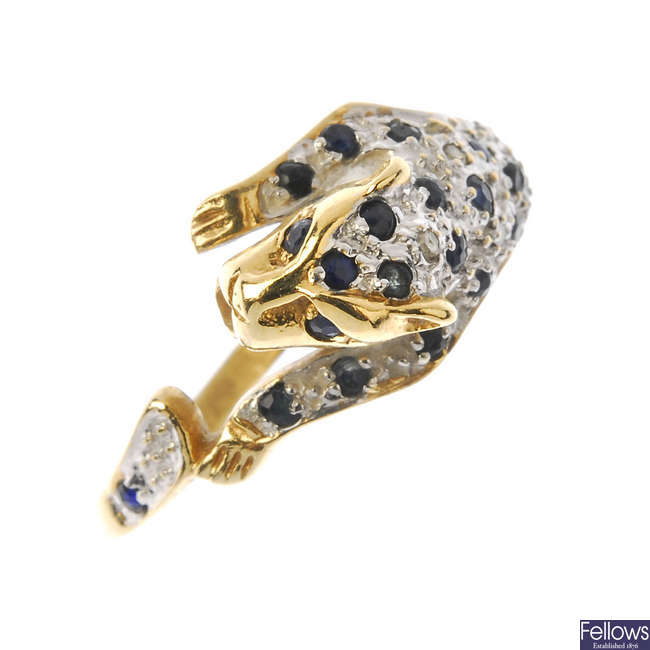 A 9ct gold sapphire and diamond leopard ring.