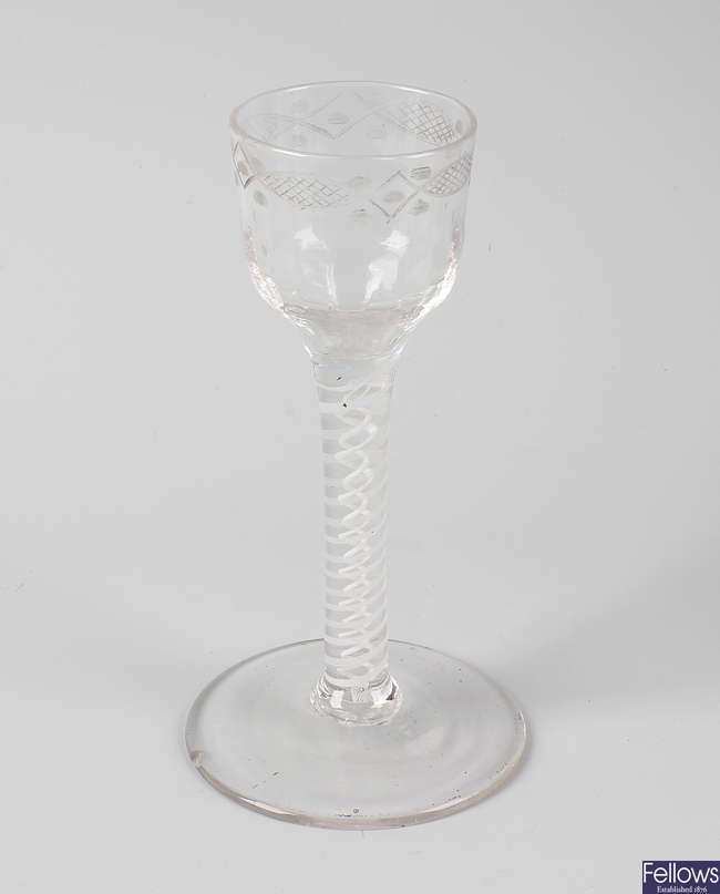 An 18th century air twist cordial glass.