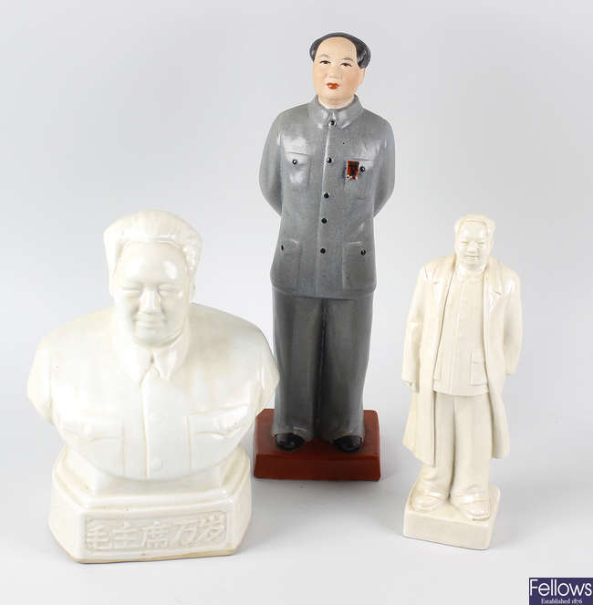 Three ceramic figures.