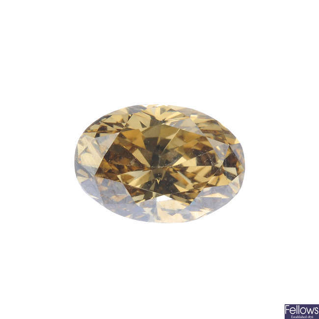 An oval-shape coloured diamond, weighing 1.68cts.