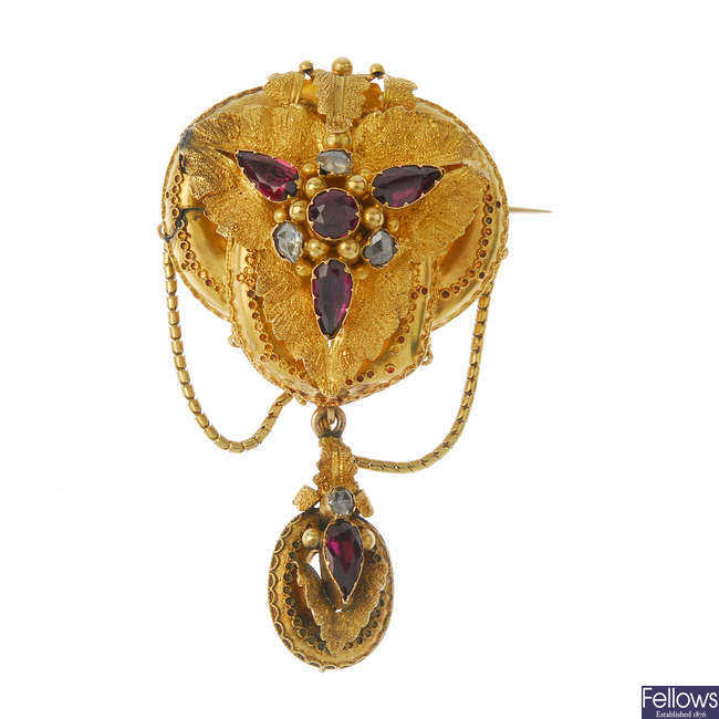 A mid Victorian garnet and diamond brooch, circa 1850.