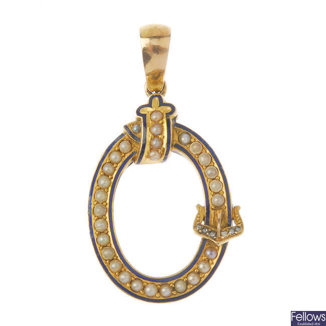 A late Victorian gold diamond and split pearl buckle pendant.