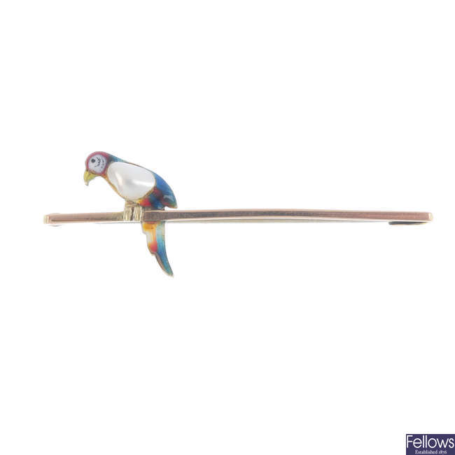 An early 20th century 9ct gold blister pearl and enamel parrot brooch.