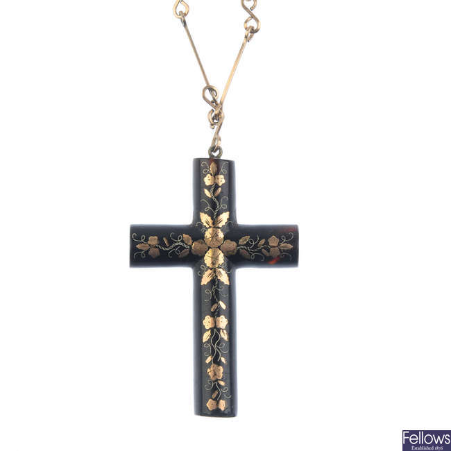 A late 19th century pique tortoiseshell cross pendant to a later added chain.