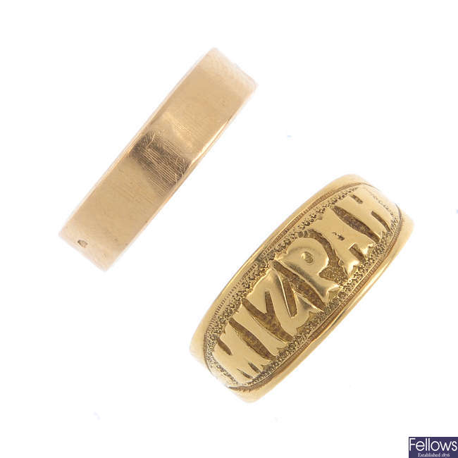 An Edwardian 18ct gold 'Mizpah' ring and a band ring.
