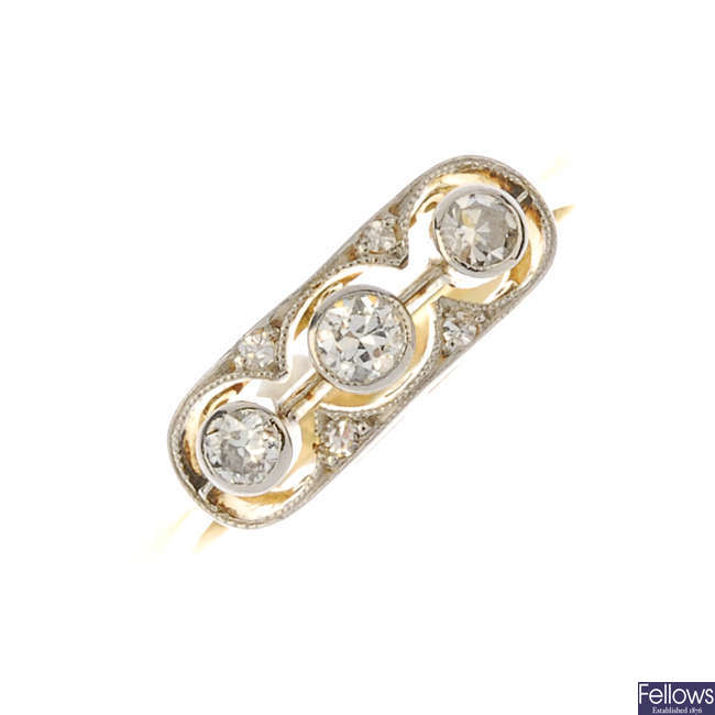 An early 20th century platinum and 18ct gold diamond dress ring.