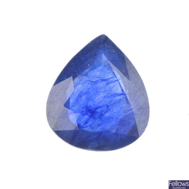 A pear-shape sapphire, weighing 7.77cts