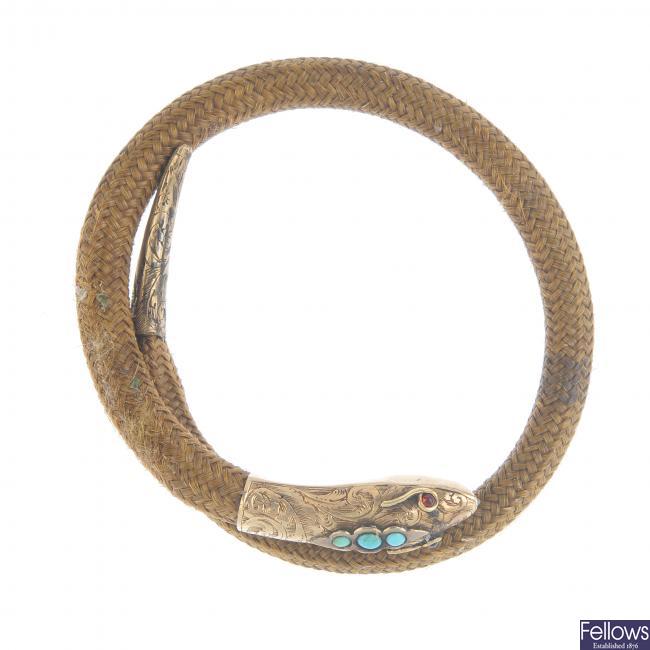 A mid Victorian woven hair snake bangle.