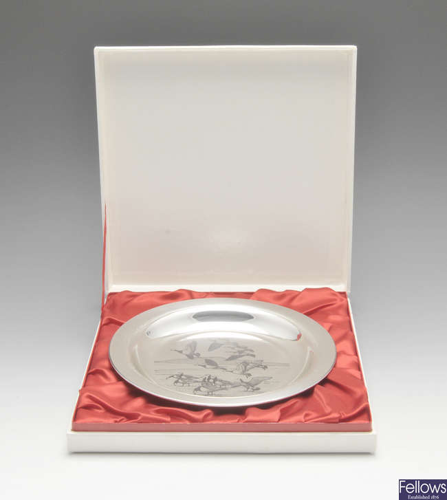 A selection of silver plates and dishes, including The Peter Scott Christmas Plate, etc.