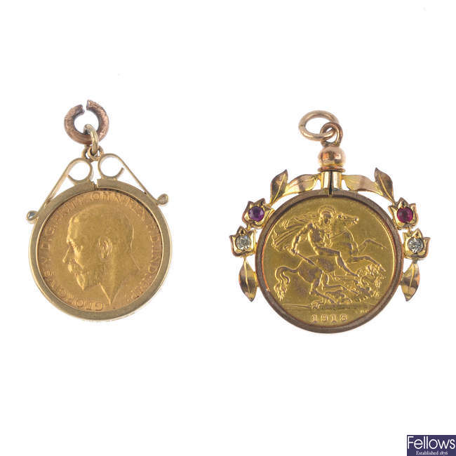 Two half-sovereign pendants.