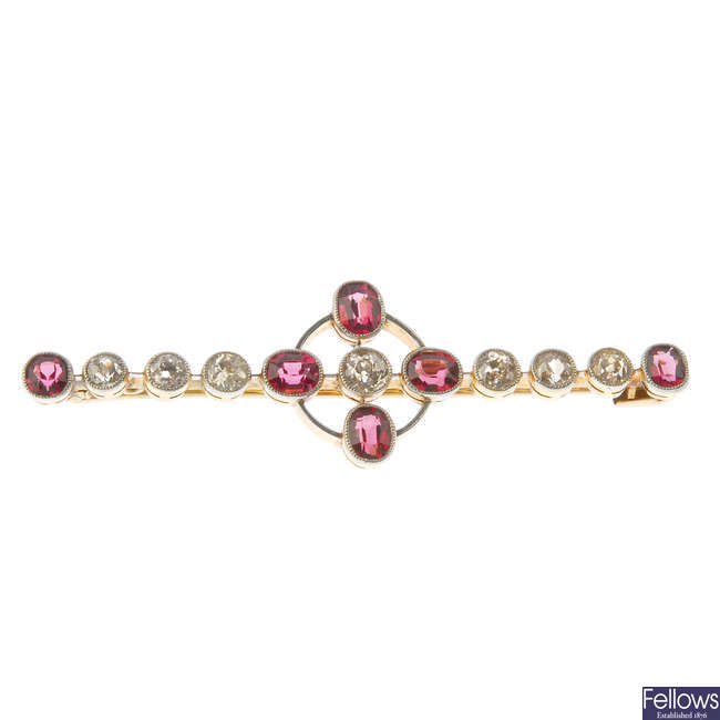 An early 20th century gold spinel and diamond brooch.