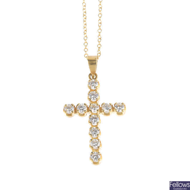 A diamond cross pendant, with 18ct gold chain.