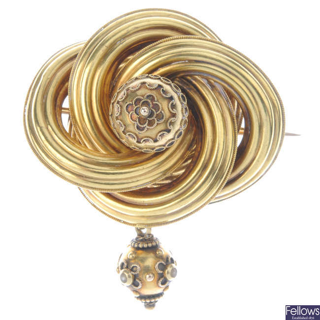 A late Victorian knot brooch with associated drop.