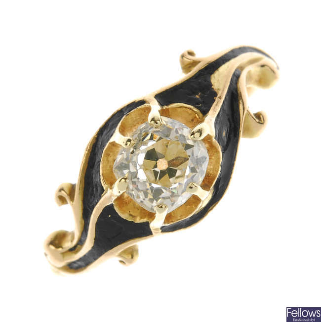 A late 19th century gold diamond and enamel single-stone ring.