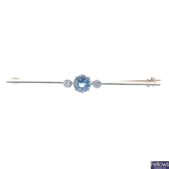 A mid 20th century aquamarine and diamond bar brooch.