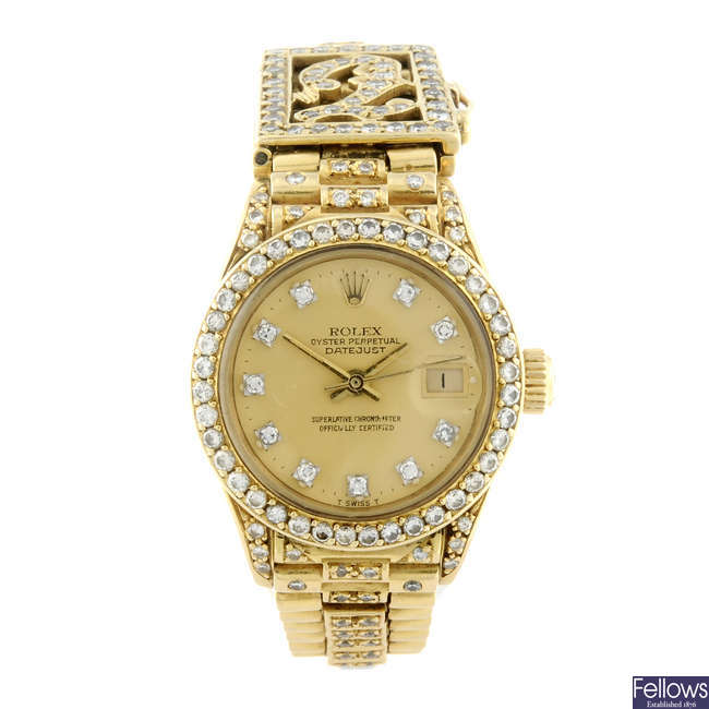 ROLEX - a lady's diamond set 18ct yellow gold Oyster Perpetual Datejust bracelet watch.