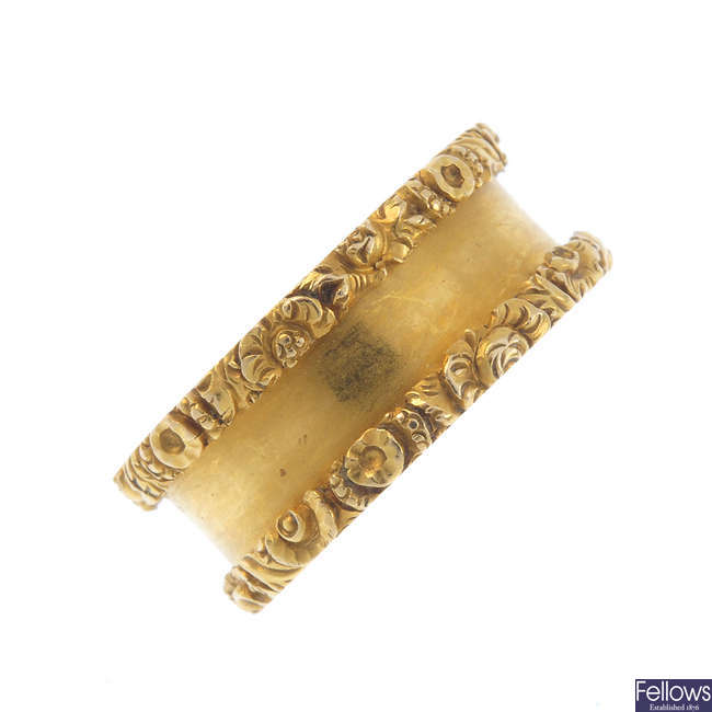 A late George III 18ct gold band ring.