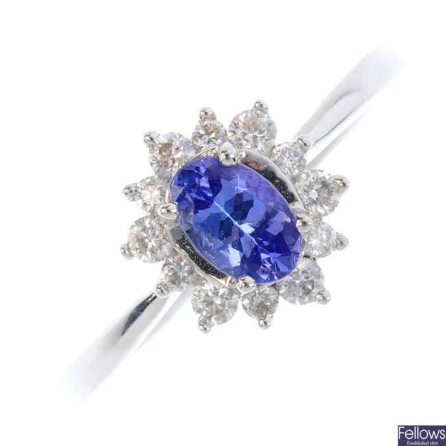 An 18ct gold tanzanite and diamond cluster ring.