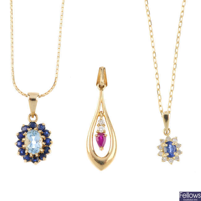 Three gem-set pendants, together with two chains and a pair of ear studs.