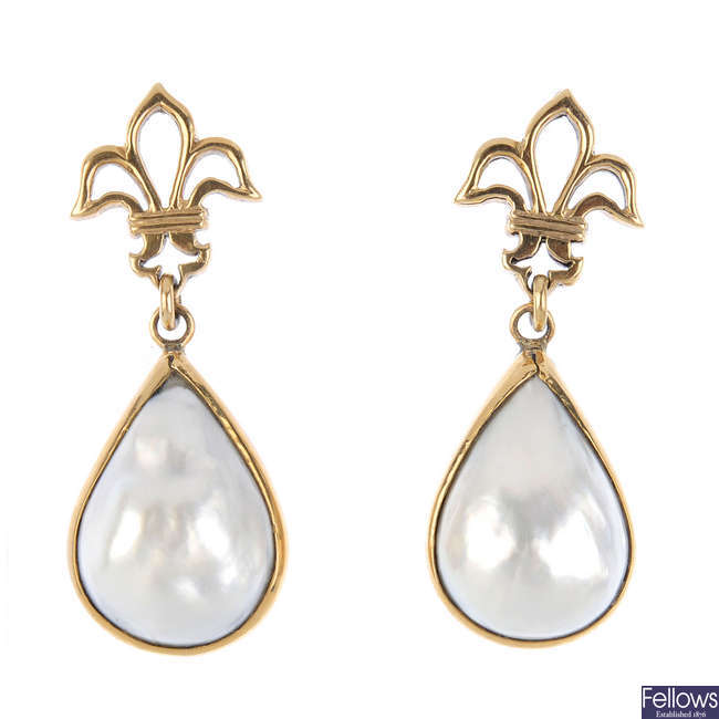 A pair of 9ct gold mabe pearl earrings.